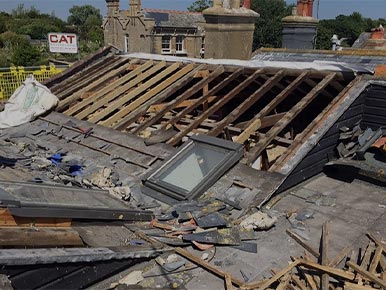 What happens if roofers uncover unforeseen damage?